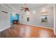Stylish living room with a fireplace, modern wood flooring, and plenty of natural light at 6045 Ne 65Th St, Silver Springs, FL 34488