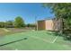 Community racquetball and basketball courts surrounded by lush green space at 6045 Ne 65Th St, Silver Springs, FL 34488
