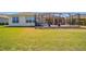 Lush backyard featuring a screened-in lanai and patio area, perfect for outdoor entertaining and relaxation at 7503 Sw 97Th Terrace Rd, Ocala, FL 34481