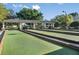 Outdoor bocce ball courts with a covered seating area, ideal for community gatherings at 7503 Sw 97Th Terrace Rd, Ocala, FL 34481