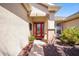 Bright red front door features glass panes and a welcoming entryway at 7503 Sw 97Th Terrace Rd, Ocala, FL 34481