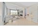 An open concept living room is spacious and offers a modern fireplace and neutral decor at 7503 Sw 97Th Terrace Rd, Ocala, FL 34481