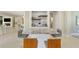 The open floor plan offers a bar area with seating and space to enjoy everyday life at 7503 Sw 97Th Terrace Rd, Ocala, FL 34481