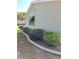 Home exterior with manicured landscaping including shrubs and concrete curb at 8107 Sw 108Th Place Rd, Ocala, FL 34481