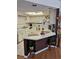 Bright eat-in kitchen featuring white cabinetry, modern appliances, and a center island at 8107 Sw 108Th Place Rd, Ocala, FL 34481