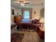 Warm main bedroom with cozy decor, comfortable bed, soft lighting, and ample closet space at 8107 Sw 108Th Place Rd, Ocala, FL 34481