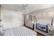 Cozy Bedroom features a white crib, dresser, and soft decor at 8215 Sw 53Rd Ct, Ocala, FL 34476