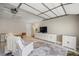 Finished garage converted to a living space with television and seating at 8215 Sw 53Rd Ct, Ocala, FL 34476