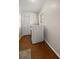 Clean laundry room with modern appliances and storage at 8215 Sw 53Rd Ct, Ocala, FL 34476