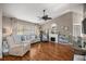 Inviting living room featuring a cozy seating area and fireplace at 8215 Sw 53Rd Ct, Ocala, FL 34476