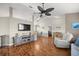Comfortable living space with a vaulted ceiling and neutral color palette at 8215 Sw 53Rd Ct, Ocala, FL 34476