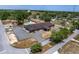 Aerial view of a community center shows the building's layout, parking area, and outdoor pool at 10040 Sw 93Rd Ct, Ocala, FL 34481