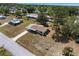Aerial view of a single Gathering home showing the roofline, yard, and surrounding area of a quiet neighborhood at 10040 Sw 93Rd Ct, Ocala, FL 34481