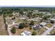An aerial view shows the layout of a neighborhood with well-maintained lawns and a variety of single Gathering homes at 10040 Sw 93Rd Ct, Ocala, FL 34481