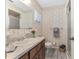 Vintage bathroom featuring patterned wallpaper, and walk in shower at 10040 Sw 93Rd Ct, Ocala, FL 34481
