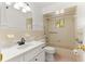 A bathtub and shower with accessibility handles provide easy bathing for users at 10946 Sw 65Th Ave, Ocala, FL 34476