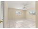 Spacious bedroom with tile flooring, and large windows for natural light at 10946 Sw 65Th Ave, Ocala, FL 34476