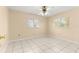 This bedroom is bright with tile floors and natural light from two windows at 10946 Sw 65Th Ave, Ocala, FL 34476