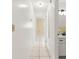 Hallway with tile floors leading to bathroom and bedrooms at 10946 Sw 65Th Ave, Ocala, FL 34476