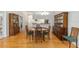 Inviting dining room with hardwood floors, traditional furnishings, and plenty of natural light at 11133 Sw 73Rd Ter, Ocala, FL 34476