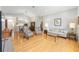 Spacious open-concept living area with hardwood flooring and natural light at 11133 Sw 73Rd Ter, Ocala, FL 34476