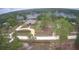 Lakefront property with a well-manicured lawn, and a long private drive on a large lot at 11921 Se 169Th Avenue Rd, Ocklawaha, FL 32179