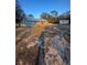 Spacious backyard with a wooden deck, perfect for entertaining and relaxing outdoors, with shed visible in the back at 11921 Se 169Th Avenue Rd, Ocklawaha, FL 32179