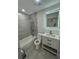 Modern bathroom featuring a bathtub, a shower, a toilet and a single sink at 11921 Se 169Th Avenue Rd, Ocklawaha, FL 32179