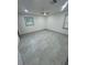 Bright bedroom features new flooring and natural light at 11921 Se 169Th Avenue Rd, Ocklawaha, FL 32179
