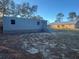 Exterior view of home features two buildings on the property at 11921 Se 169Th Avenue Rd, Ocklawaha, FL 32179