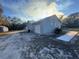A single-story home with light-gray siding and a one-car garage at 11921 Se 169Th Avenue Rd, Ocklawaha, FL 32179