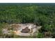 Picturesque aerial shot of a new home site bordered by lush greenery at 13491 E Hwy 316, Fort Mc Coy, FL 32134