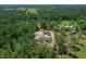 Panoramic aerial image featuring a new home site surrounded by mature trees and green space at 13491 E Hwy 316, Fort Mc Coy, FL 32134