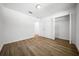 Large bedroom showcasing wood-look flooring and natural light at 13491 E Hwy 316, Fort Mc Coy, FL 32134