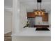 Modern kitchen featuring wood cabinets, stainless steel appliances, quartz countertops and pendant lighting at 14476 Sw 43Rd Court Rd, Ocala, FL 34473