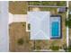 Aerial view of property featuring a screened-in pool, fenced in yard and mature landscaping at 1453 Ne 161St Pl, Citra, FL 32113