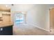 Cozy dining area with a view of the pool, featuring modern chandelier and access to kitchen at 1453 Ne 161St Pl, Citra, FL 32113