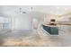 Inviting living room with open layout to kitchen, bright with natural light and modern appliances at 1453 Ne 161St Pl, Citra, FL 32113