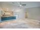 Bright and airy living space with vaulted ceilings and a seamless transition into a modern kitchen area at 1453 Ne 161St Pl, Citra, FL 32113