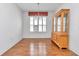 Formal dining room with hardwood floors and a window providing natural light at 15239 Sw 15Th Terrace Rd, Ocala, FL 34473