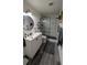 Modern bathroom boasts a walk-in shower, sleek vanity, and attractive finishes at 2219 Ne 18 Ave, Ocala, FL 34470