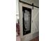Carrier HVAC unit with a sliding barn door at 2219 Ne 18 Ave, Ocala, FL 34470