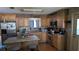 Bright kitchen featuring wooden cabinets, stainless steel appliances, and a stylish butcher block island at 2219 Ne 18 Ave, Ocala, FL 34470