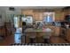 Well-lit kitchen with stainless steel appliances, wood cabinets, and a charming butcher block island at 2219 Ne 18 Ave, Ocala, FL 34470