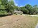 A single-story house with a well-maintained lawn at 26 Hemlock Circle Way, Ocala, FL 34472