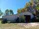 Large barn on a sunny day, blending functionality with natural beauty at 2630 Nw 140Th St, Citra, FL 32113