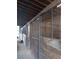 Interior of horse stall with wooden walls and metal bars, offering safe and secure accommodation at 2630 Nw 140Th St, Citra, FL 32113