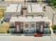 Aerial view of modern townhomes with brick accents, balconies, and convenient parking at 288 N Oak Ave, Sanford, FL 32771