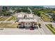 Aerial view of newly constructed townhomes in an urban area near city streets at 288 N Oak Ave, Sanford, FL 32771