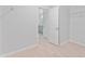 Bright walk-in closet with white walls, wire shelving, and light wood-look flooring at 288 N Oak Ave, Sanford, FL 32771